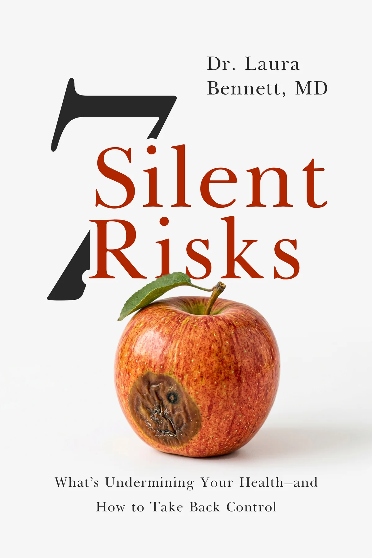 The cover of 7 Silent Risks by Dr. Laura Bennett, MD: a red apple with one soft brown spot, under the title.